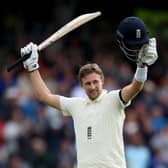 LEADING MAN: England captain Joe Root celebrates reaching 100 on day two of the Third Test match against India at Headingley Picture: Nigel French/PA
