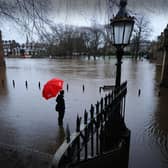 A passer-by looks at the flooding in York in January 2021. Picture: Simon Hulme
