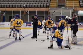 BACK AT IT: Dave Whistle gets his point across to his Leeds Knights' players during Thursday's practice session at Elland Road Ice Arena.