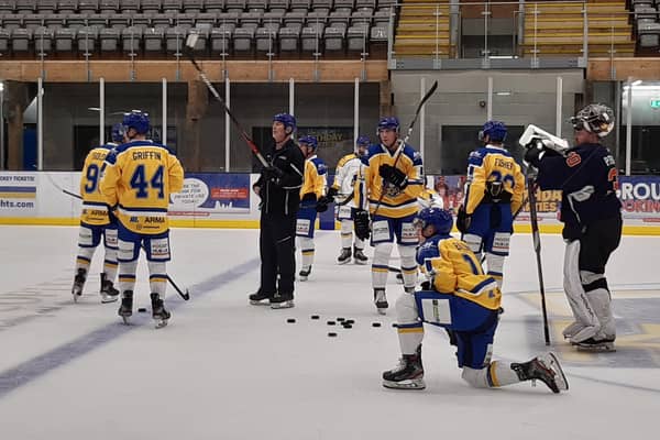 BACK AT IT: Dave Whistle gets his point across to his Leeds Knights' players during Thursday's practice session at Elland Road Ice Arena.