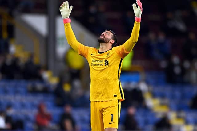 Liverpool goalkeeper Alisson could miss Leeds game (Picture: PA)