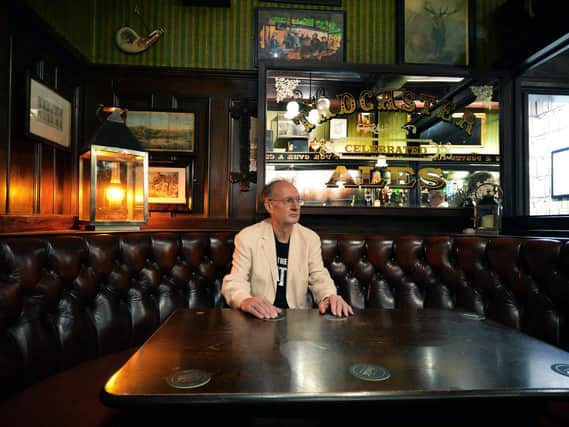 Paul Jennings, who has written a book all about the history of the English pub, in Hales Bar, the oldest bar in Harrogate. (Jonathan Gawthorpe).
