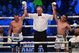 DRAW: Josh Warrington and Mauricio Lara have their arms raised. Picture: Matthew Pover/Matchroom Boxing