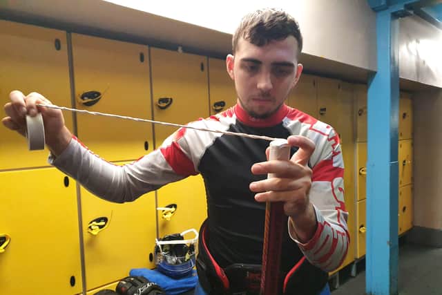 Ethan Hehir tapes his stick handle ahead of SAturday's encounter at Swindon.