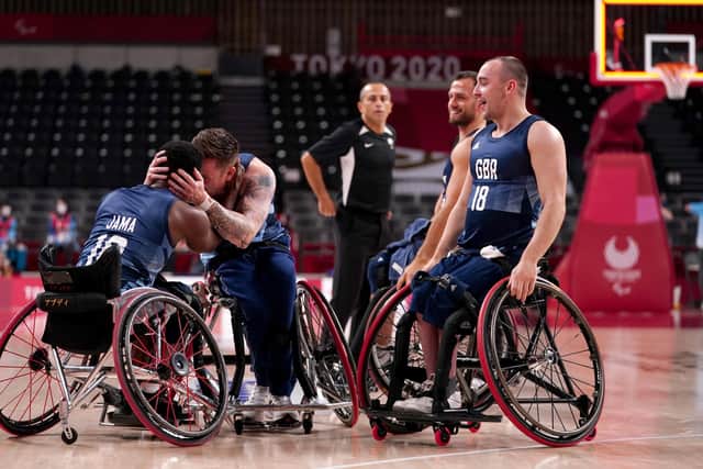Great Britain's Terry Bywater celebrates with teammate Abdi Jama, (left) after the end of the match following their victory over Spain in the Wheelchair basketball Bronze medal match at the Ariake Arena during day twelve of the Tokyo 2020 Paralympic Games in Japan. (Picture: John Walton/PA Wire)