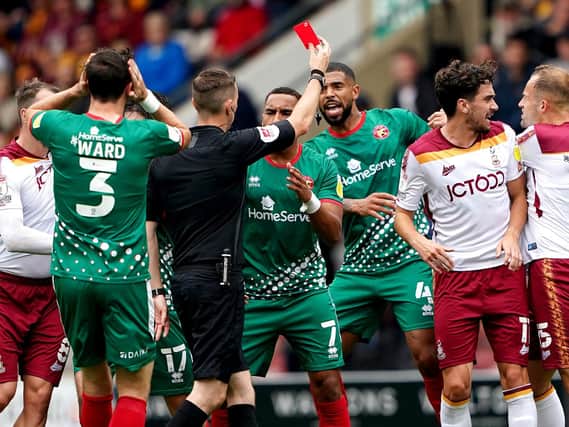 Walsall captain Joss Labadie sees red in his side's game at Bradford City. Picture: PA.