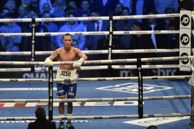 Dejected: Josh Warrington after the fight was stopped (Picture: Steve Riding)