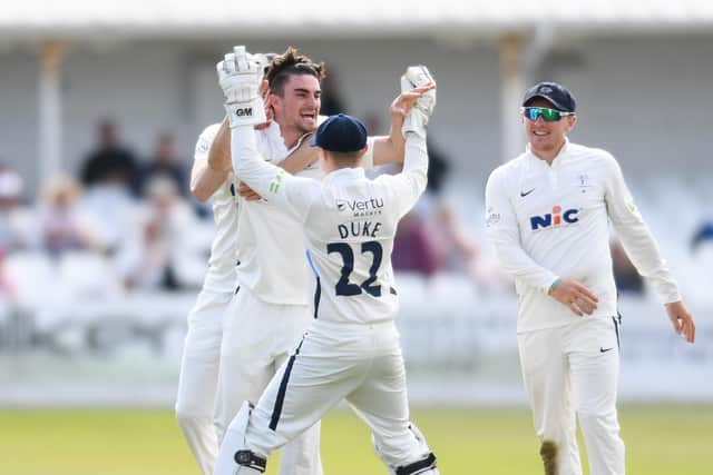 Yorkshire's Jordan Thompson celebrates with Harry Duke after the wicket of Somerset's Tom Banton for no score.