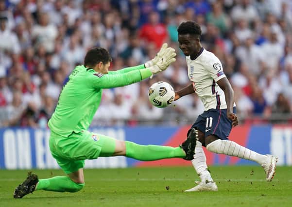 Close: Andorra goalkeeper Josep Gomes saves from England's Bukayo Saka during the 4-0 win. Picture: Nick Potts/PA Wire.