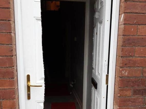 Police smashed through the door of the property where they discovered around 10kg of cannabis