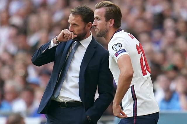 England's Gareth Southgate speaks with substitute Harry Kane on the touchline at Wembley on Sunday Picture: Nick Potts/PA