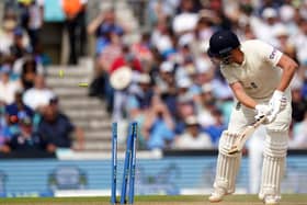 England's Jonny Bairstow looks back as he is bowled out by Indai's Jasprit Bumrah on day five at the Kia Oval Picture: Adam Davy/PA