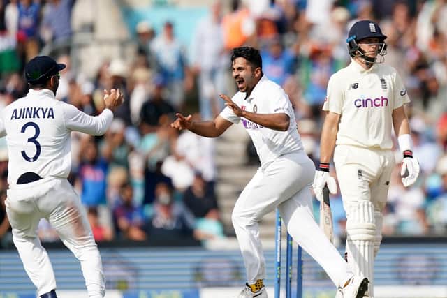 Key wicket: India's Shardul Thakur (centre) celebrates the wicket of England's Joe Root. Picture: Adam Davy/PA Wire.