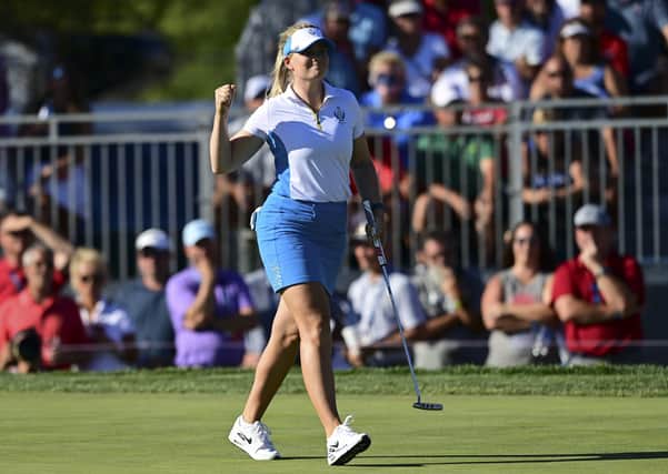Europe's Matilda Castren celebrates after her win on the 18th hole agains United States' Lizette Salas. (AP Photo/David Dermer)