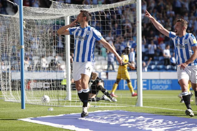 Matty Pearson of Huddersfield Town celebrates scoring the opener in the thrashing of Reading. (Picture: John Early/Getty Images)