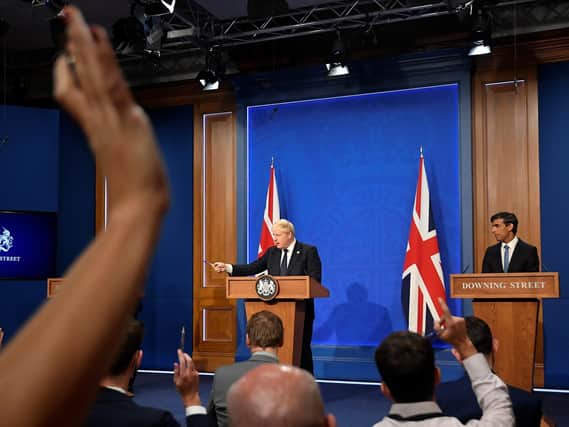 Prime Minister Boris Johnson and Chancellor of the Exchequer Rishi Sunak, during a media briefing in Downing Street, London, on the long-awaited plan to fix the broken social care system