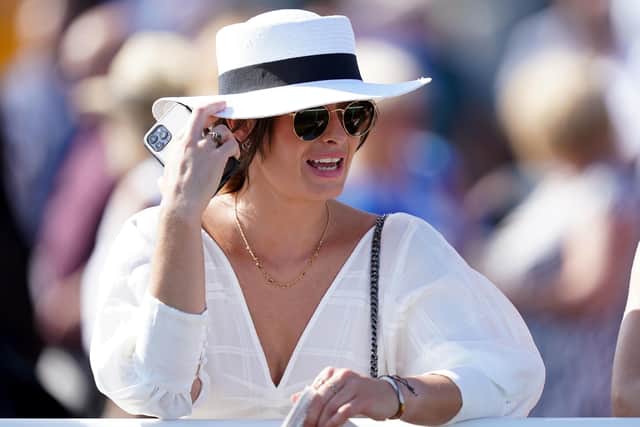 A racegoer during Legends Day of the Cazoo St Leger Festival at Doncaster Racecourse.