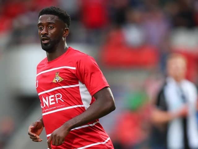 DIGGING DEEP: Doncaster Rovers' Jordy Hiwula Picture: Robbie Jay Barratt - AMA/Getty Images