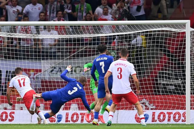 Damian Szymanski of Poland heads the ball past Jordan Pickford of England to equalize (Picture: Michael Regan/Getty Images)