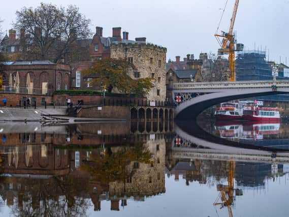 The man climbed onto the wrong side of a safety barrier on the River Ouse in York