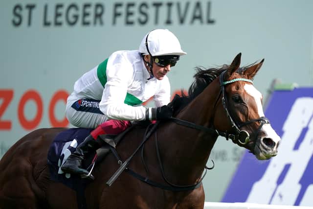 Free Wind ridden by Frankie Dettori wins The Hippo Pro3 Park Hill Fillies' Stakes during Ladies Day of the Cazoo St Leger Festival at Doncaster racecourse.