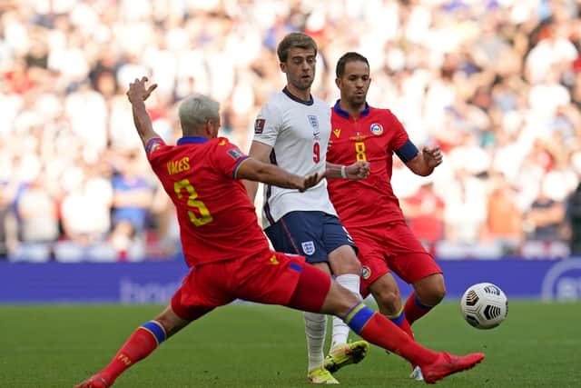 England's Patrick Bamford (centre) in action with Andorra's Marc Vales (left) and Marcio Vieira (Picture: PA)