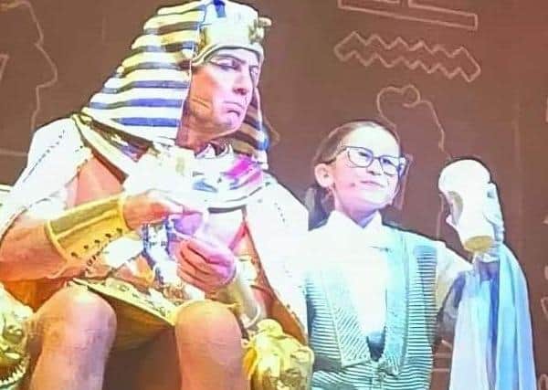 Holly Jade Roberts, 9 shares the stage with Jason Donovan as Pharoh.