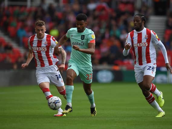 Huddersfield Town forward Fraizer Campbell on the charge against Stoke City. Picture: Getty Images