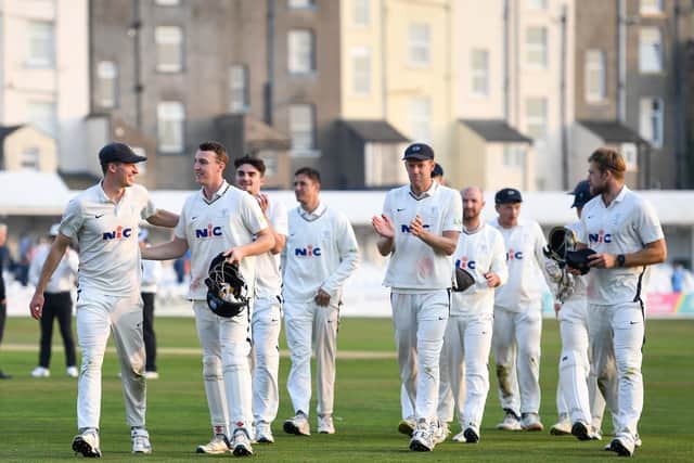 TIMELY BOOST:Yorkshire leave the field at Scarborough after beating Somerset by an innings and thirty three runs. Picture by Will Palmer/SWpix.com