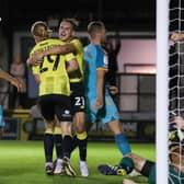 Harrogate Town's Luke Armstrong (left) celebrates with Jack Diamond after scoring their side's second goal. Picture: PA