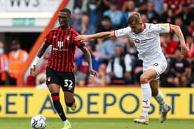 Bournemouth's Jaidon Anthony feel pressure from Barnsley's Michal Helik. Picture: Mark Kerton/PA