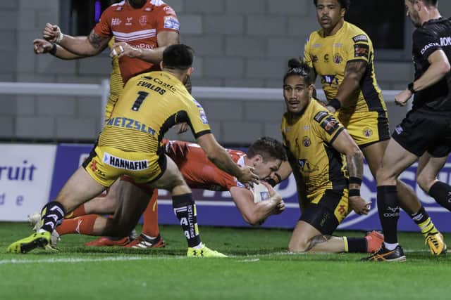 Wrapped up: Hull KR's Matt Parcell scores a try against Castleford. Picture by Dean Atkins/SWpix.com