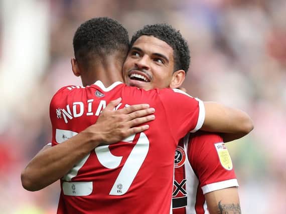 LINK-UP: Morgan Gibbs-White (facing camera) showed a great understanding with Iliman Ndiays in Sheffield United's 6-2 win over Peterborough United