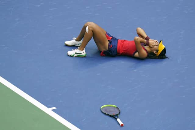 UNBELIEVABLE: Emma Raducanu lies on the court after defeating Leylah Fernandez in the US Open women's singles final in New York Picture: AP Photo/Frank Franklin II
