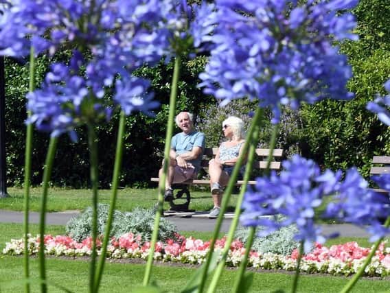 A couple sitting on a bench in the Valley Gardens, Harrogate, during a heatwave. (Gary Longbottom)
