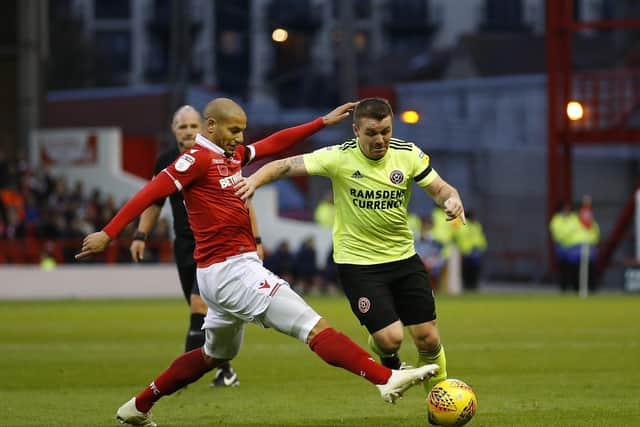 Champion class: Algeria midfielder Adlene Guedioura, left, in action for Nottingham Forest against Sheffield United has signed a one-year deal with the Blades.Picture: Simon Bellis/Sportimage