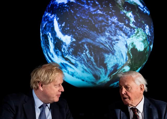 File photo dated 04/02/20 of Prime Minister Boris Johnson (left) and Sir David Attenborough during the launch of the next COP26 UN Climate Summit at the Science Museum, London.