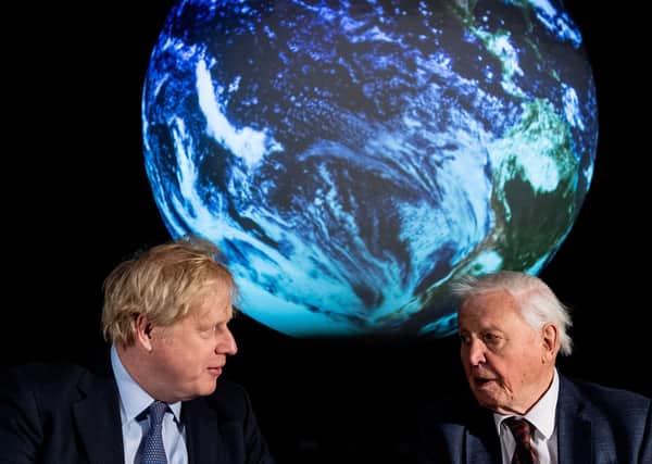 Prime Minister Boris Johnson (left) and Sir David Attenborough during the launch of the next COP26 UN Climate Summit.