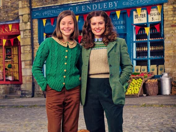 Imogen Clawon, right, with Rachel Shenton on set in Grassington, which is dressed as Darrowby.