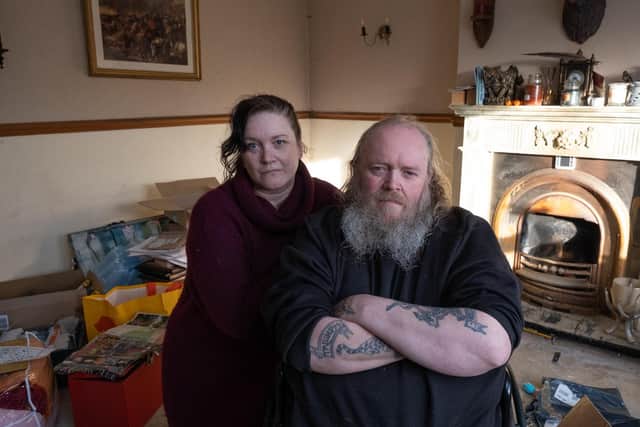 Andrew Mott, right, with wife Sara, after their home was hit by flooding in 2019. Picture: Tom Maddick / SWNS.