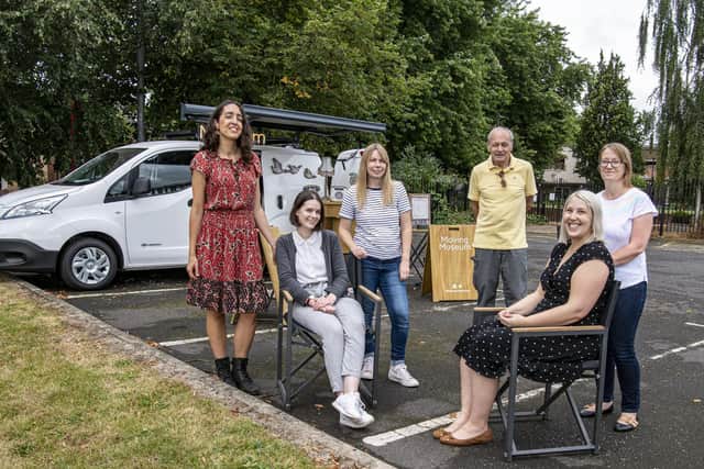 Victoria Ryves, programme manager for Heritage Doncaster pictured seated right, with staff members who will be touring the Moving Museum. Image by Tony Johnson