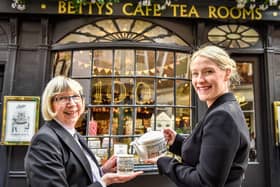 Long-serving Little Bettys staff member Pam Broadbent and branch manager Sarah Barnacle on the 100th anniversary of Bettys in 2019