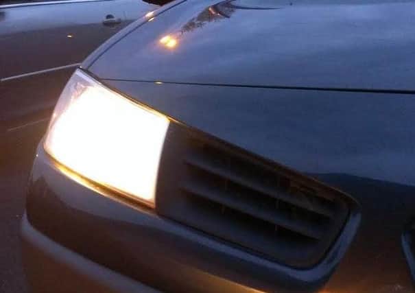 What should be done about defective car headlights?