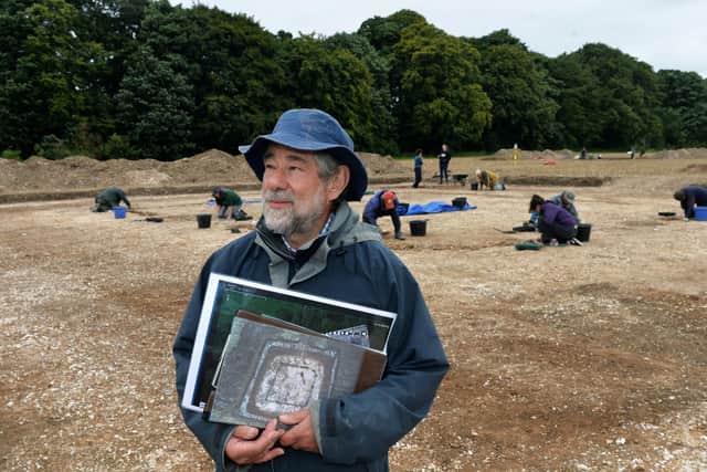 Dr Peter Halkon, Senior Lecturer in Archaeology at the University of Hull, at the "shrine" site - those in the background are working on an entranceway to the fort