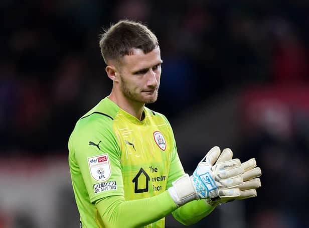 Barnsley goalkeeper Bradley Collins reacts after the final whistle (Picture: PA)