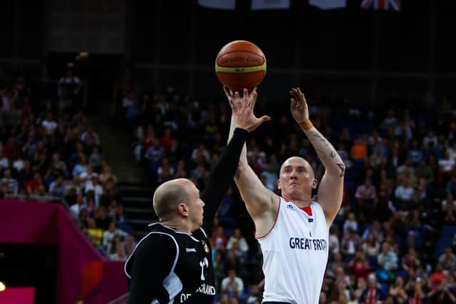 Great Britain's Terry Bywater shoot's for a basket under pressure from Germany's Dirk Passiwan at the North Greenwich Arena at London 2012. (Picture: John Walton/PA Wire)