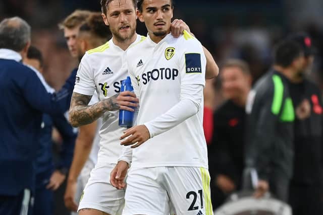 ABSENTEES: Liam Cooper (left) is Leeds United's only available senior centre-back after Pascal Struijk (right) was unable to overturn his red card against Liverpool