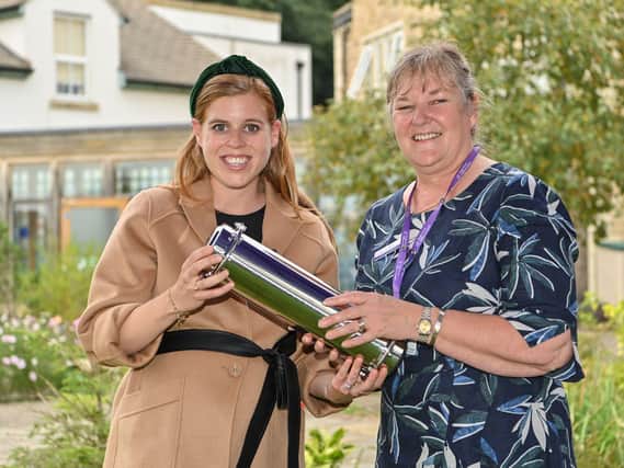 Princess Beatrice with the time capsule