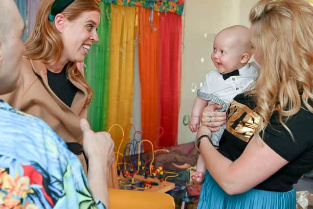 The pregnant Princess met children and their parents