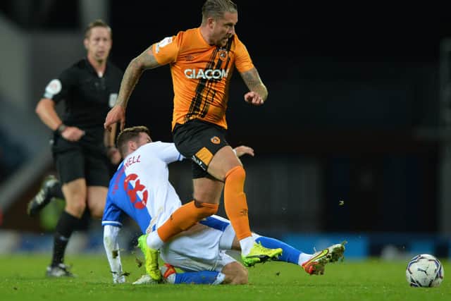 George Moncur avoids a challenge from Joe Rothwell during Hull City's defeat at Blackburn Rovers (Picture: Bruce Rollinson)